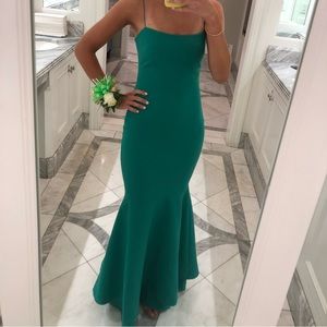 This green gown by Likely has only been worn once and is in perfect condition.